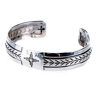 Silver Native American bracelet with tribal engraving