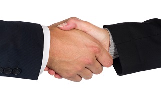 man and woman shaking hands