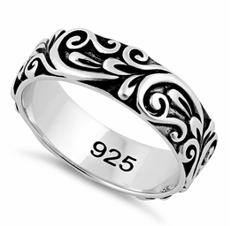 A silver ring with floral design
